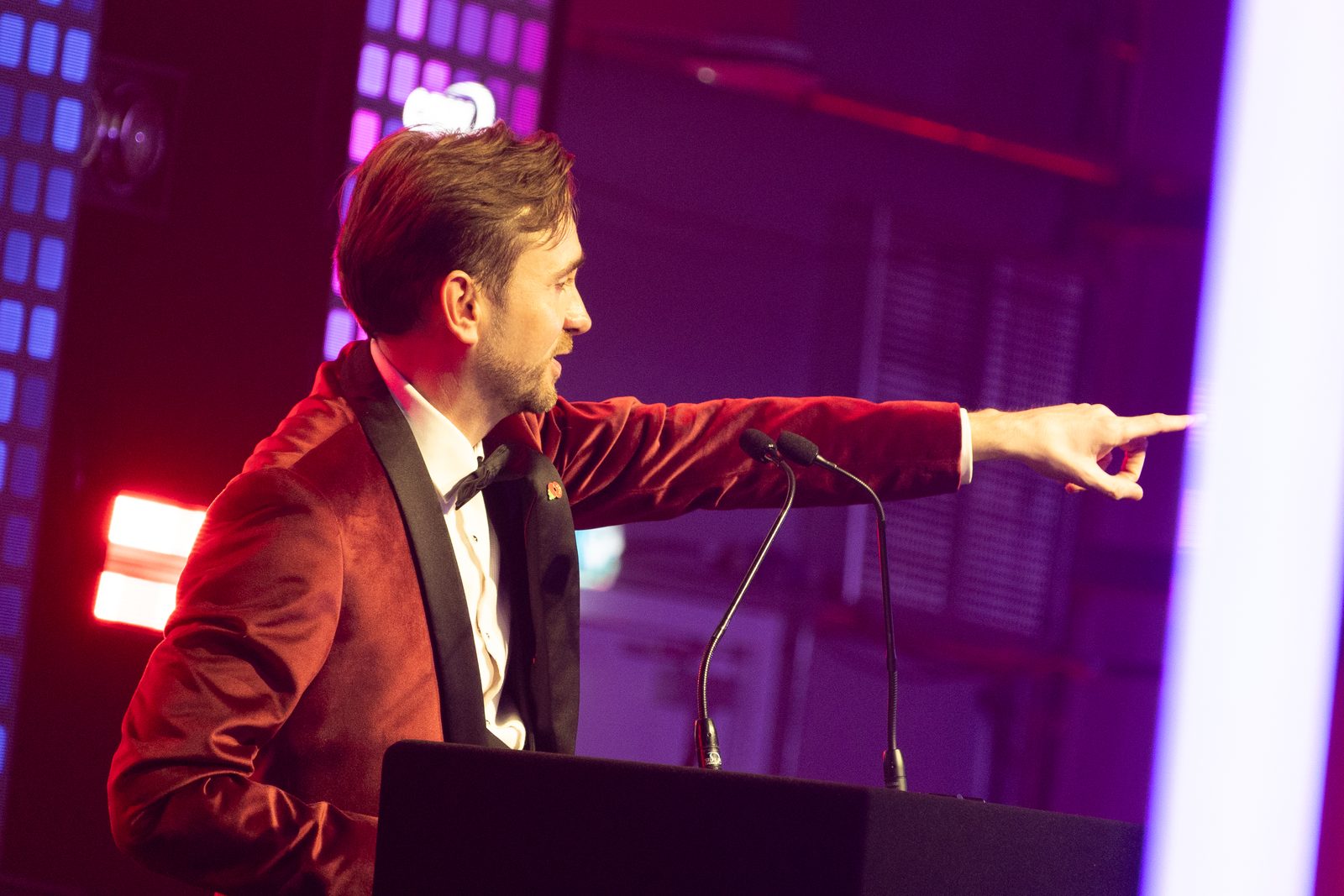 Kevin Durham taking a bid from the floor during the MAG Charity Ball live auction